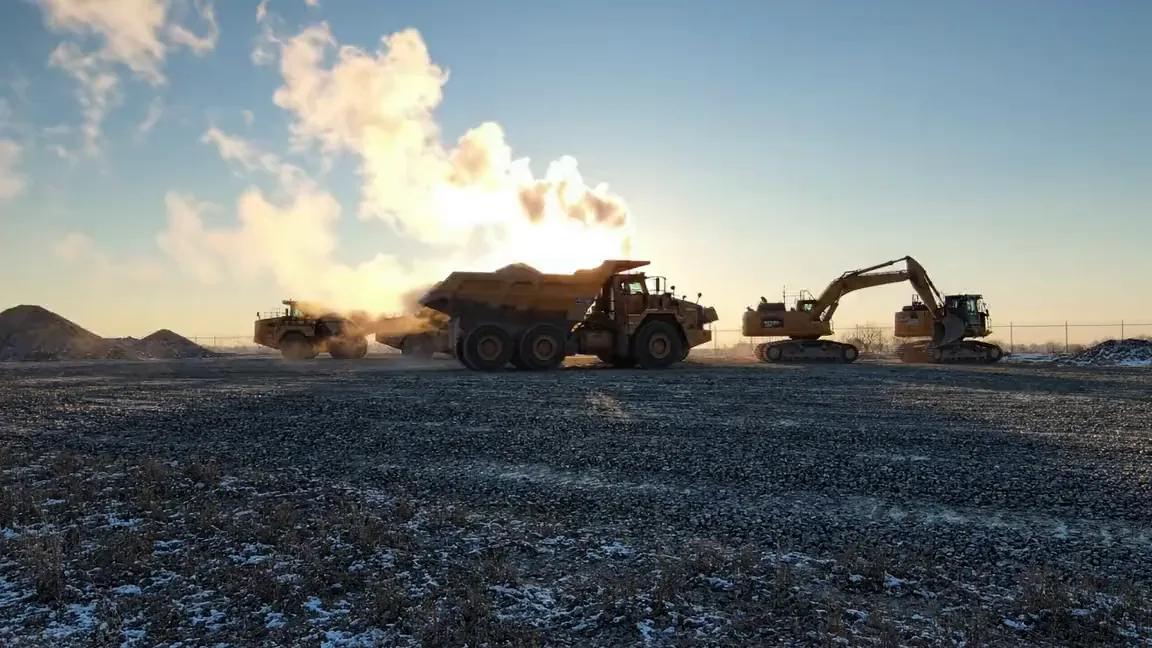 Chris Harp Construction equipment lined up at dawn